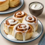 Why add heavy cream to cinnamon rolls?