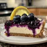 What are the two main difference between a traditional cheesecake and a New York cheesecake?